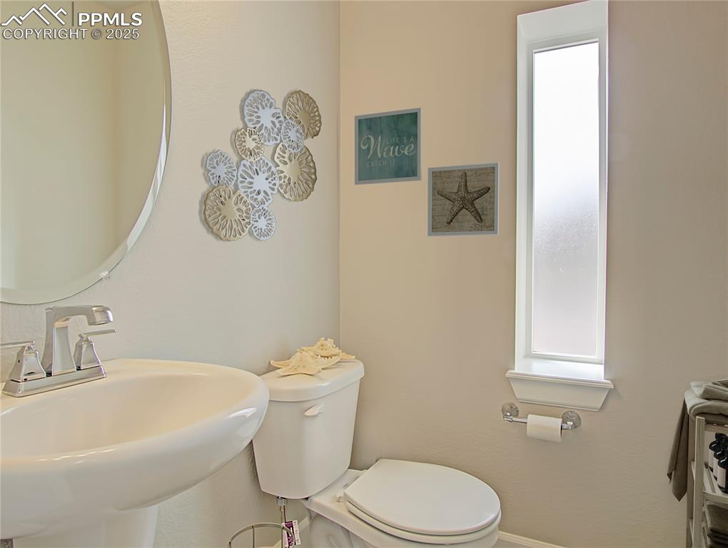 Image 12 of 18: Main level powder bath *Photos are for marketing purposes only. Colors, fix