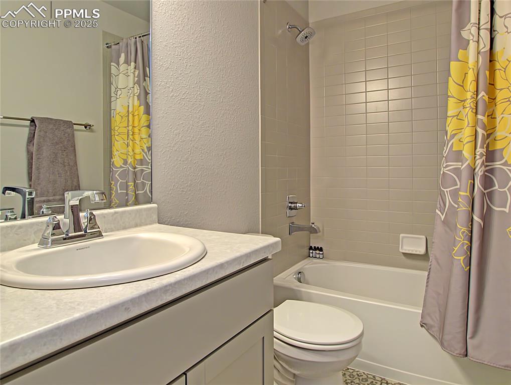 Image 16 of 18: Upper level hall bath *Photos are for marketing purposes only. Colors, fixt