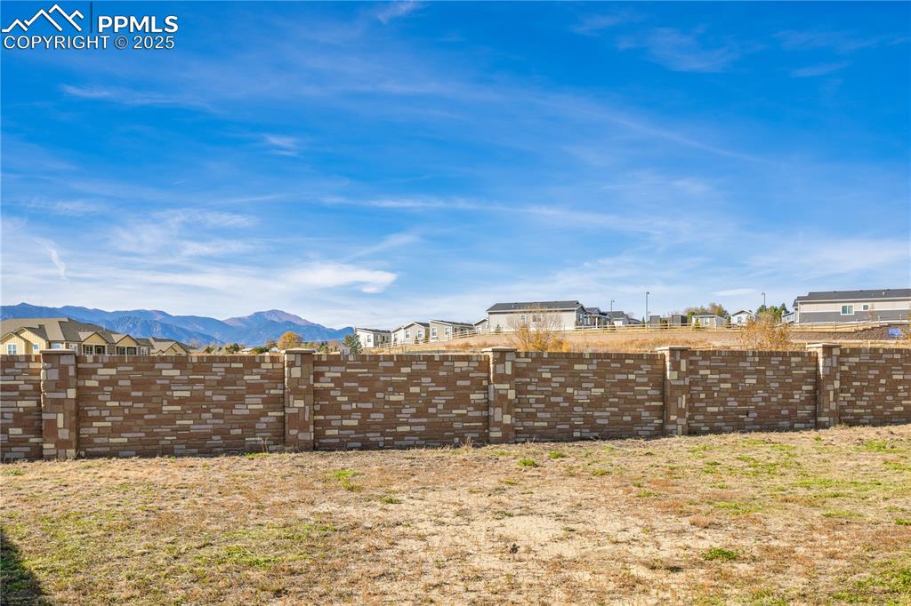 Image 2 of 35: View of yard with a mountain view