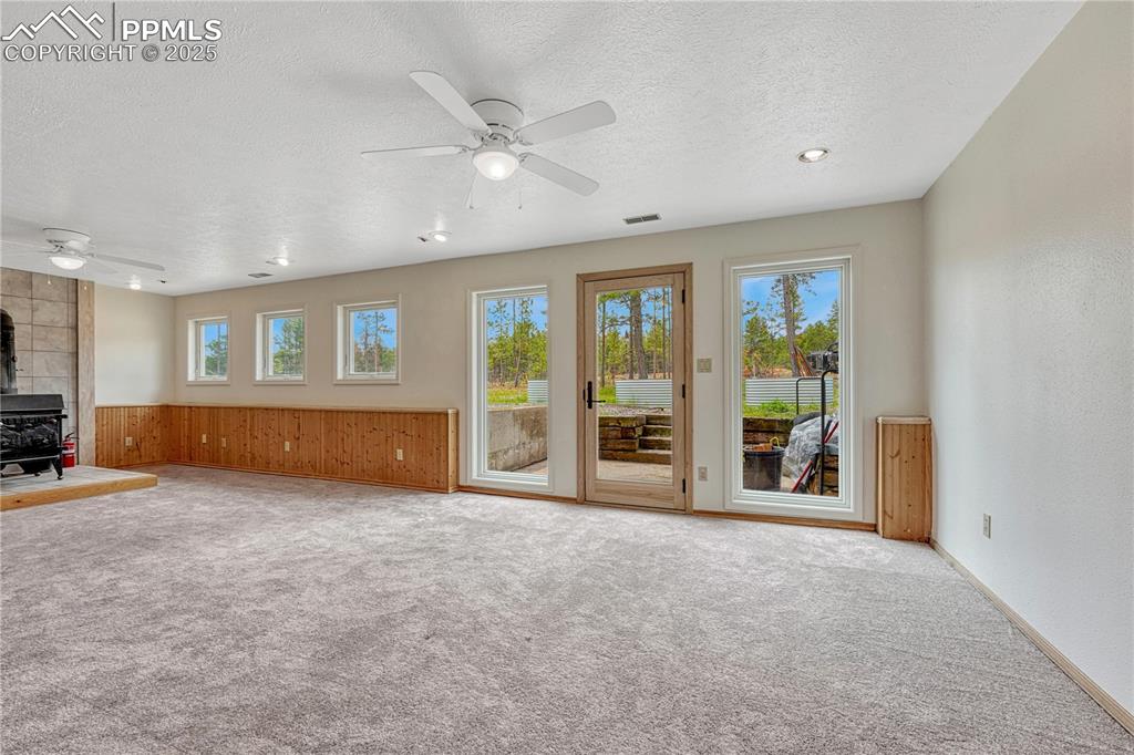 Image 21 of 48: Walk-out basement family room