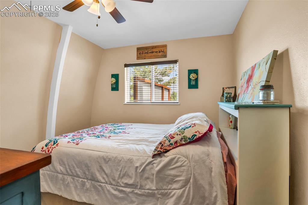 Image 12 of 50: Main Level Bedroom