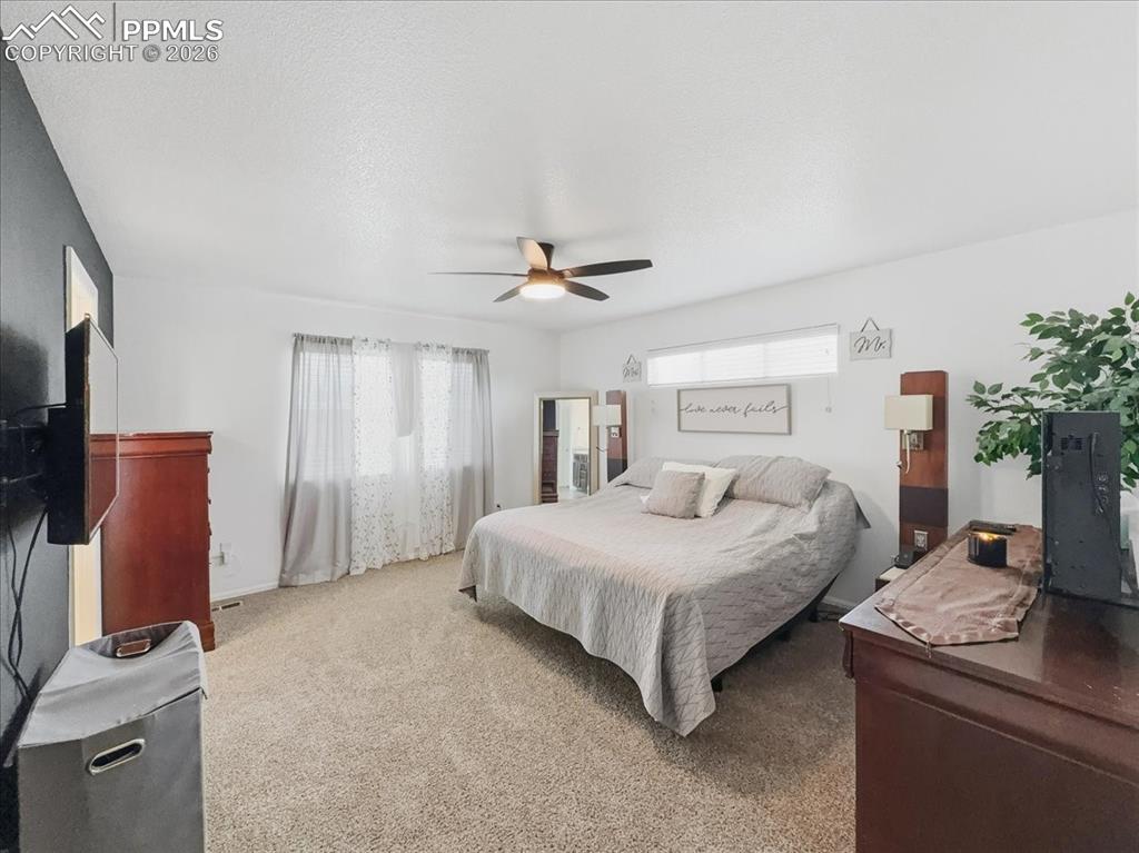 Image 15 of 38: Master bedroom