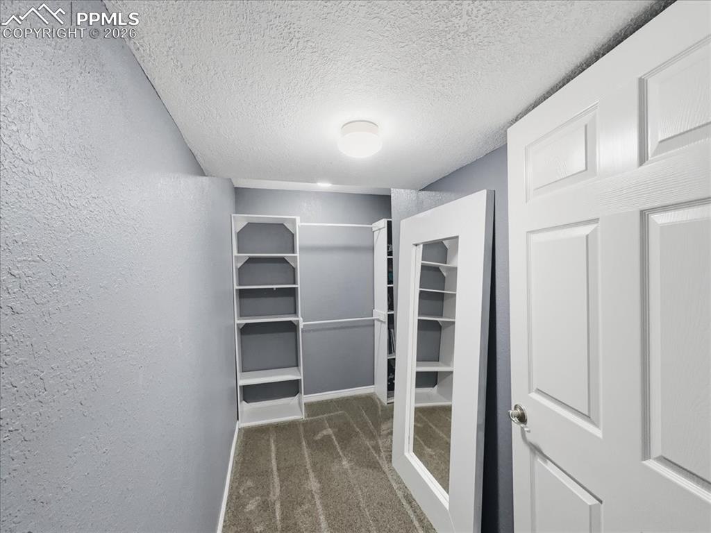 Image 23 of 38: Closet