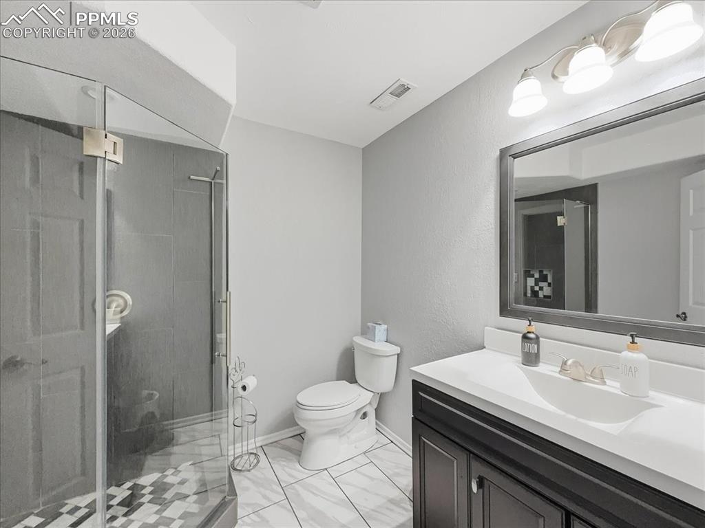 Image 32 of 38: Basement bathroom