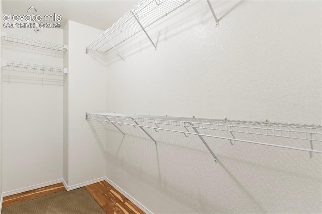 Image 20 of 28: Walk-In Closets