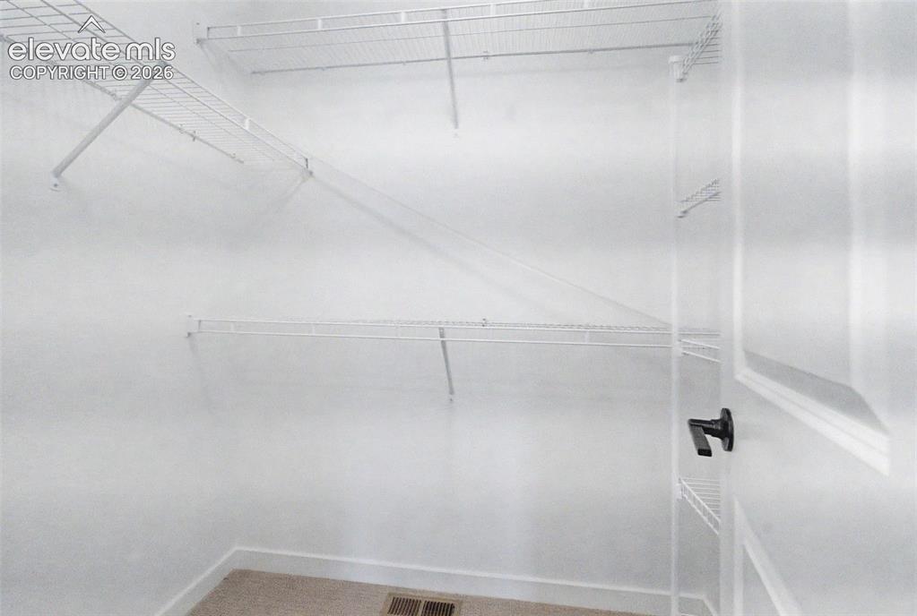 Image 28 of 39: Closet