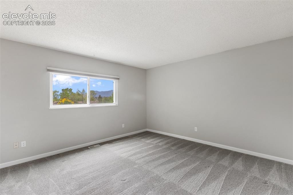 Image 16 of 28: Upper Bedroom