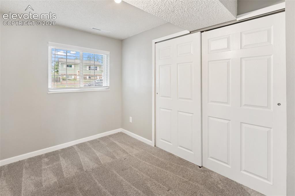 Image 19 of 28: Lower Bedroom
