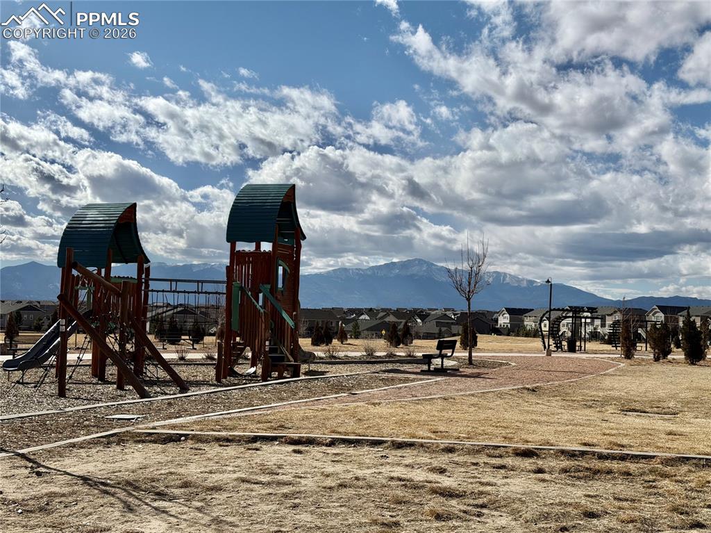 Image 39 of 40: Large playground with Pikes Peak Views