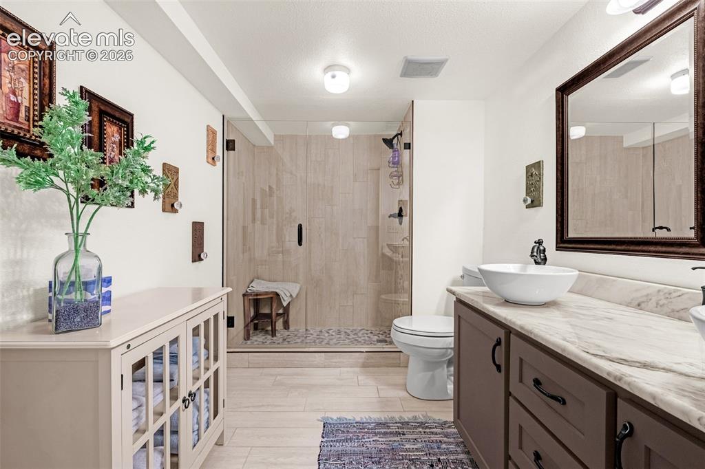 Image 30 of 43: Basement bath