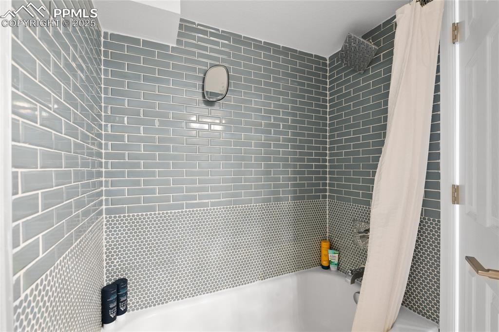 Image 39 of 47: Full bath featuring shower / tub combo