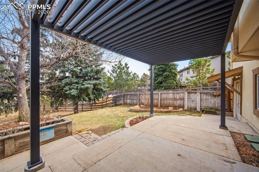 Image 38 of 50: louvered covered patio