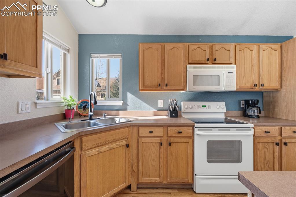 Image 10 of 36: Main level kitchen