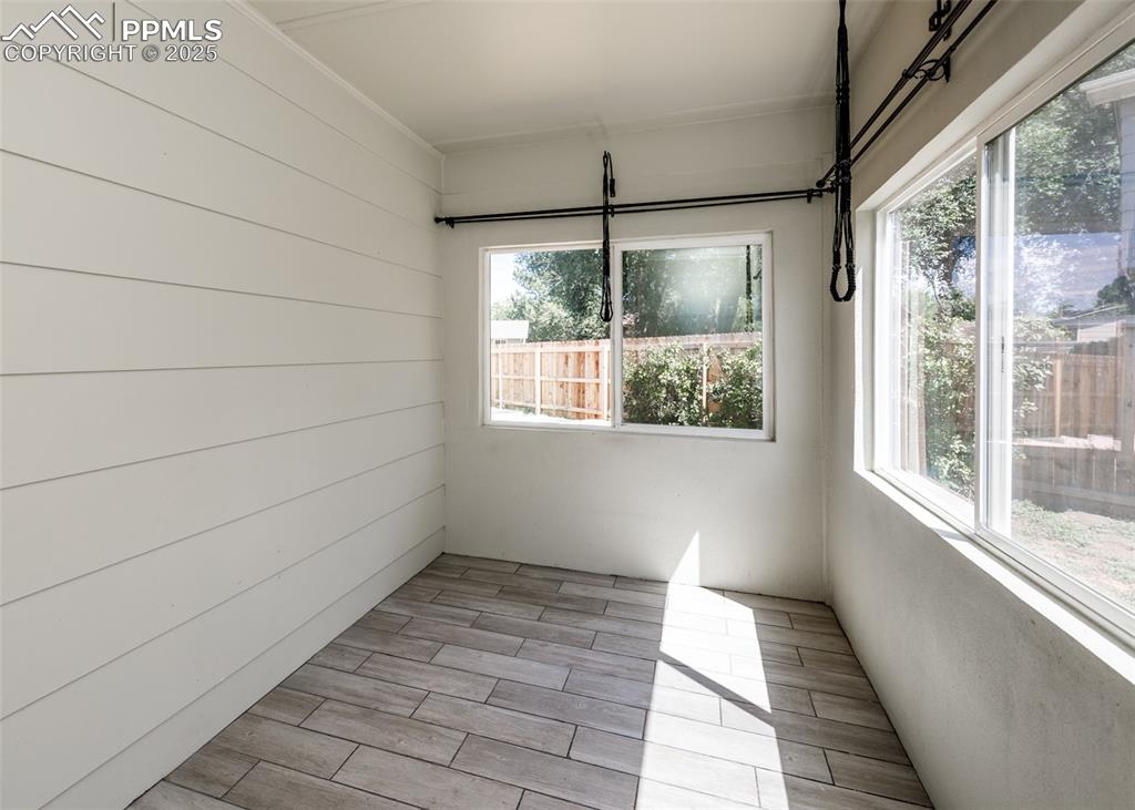 Image 28 of 48: View of unfurnished sunroom
