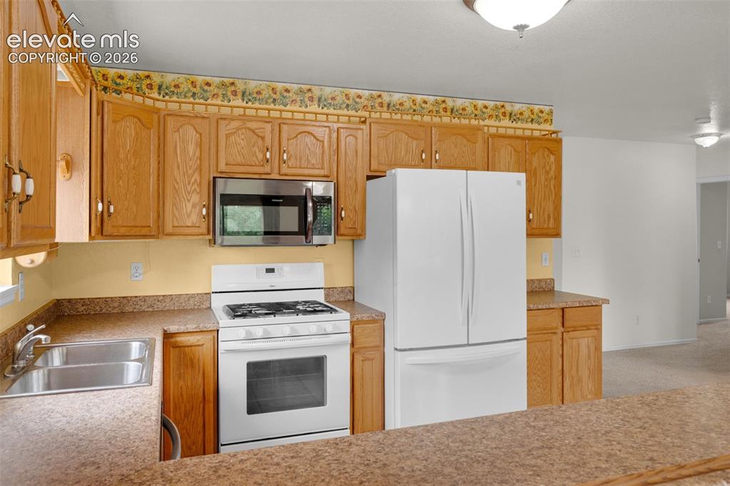 Image 15 of 29: Huge kitchen and dining area