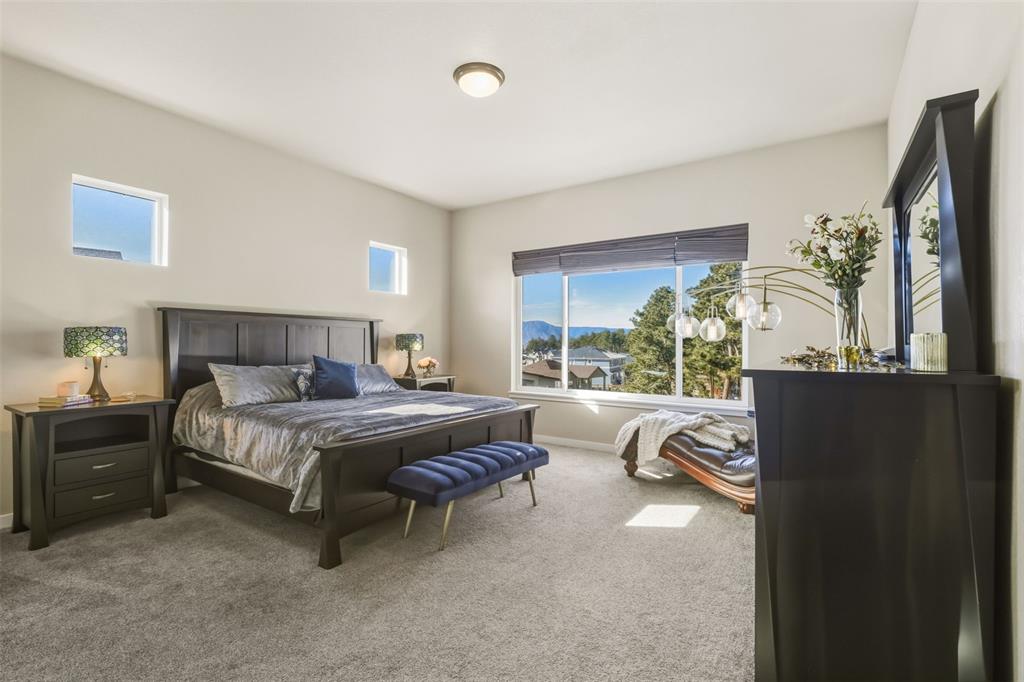 Image 16 of 50: Master Bedroom