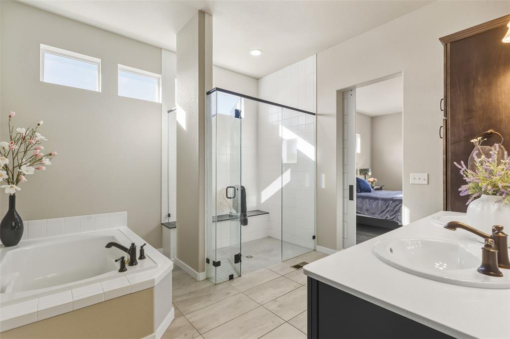 Image 19 of 50: Master Bathroom