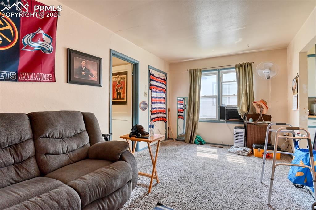 Image 13 of 38: Unit 1509 Living Room - note - window a/c unit is excluded