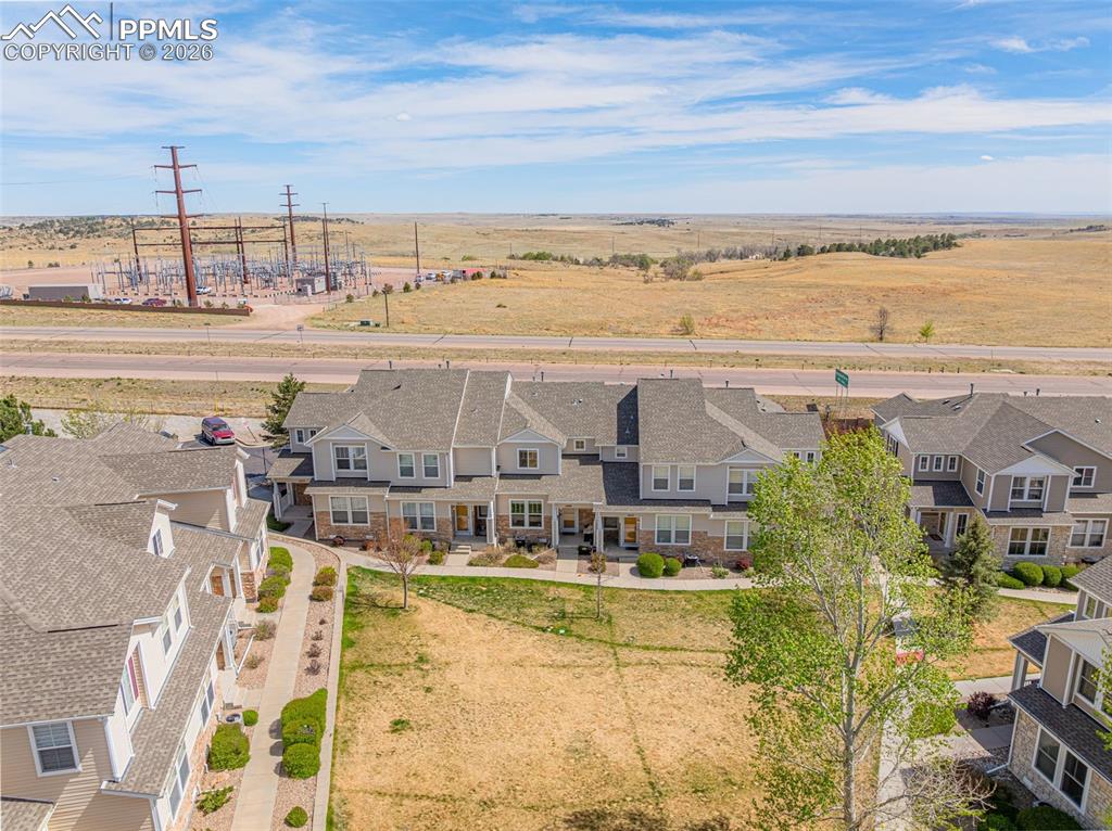 Image 22 of 29: Contemporary townhome-style units featuring multi-level construction, gable