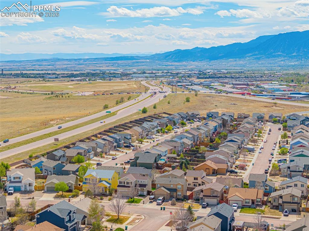 Image 28 of 29: Aerial perspective showcasing a residential neighborhood with diverse archi