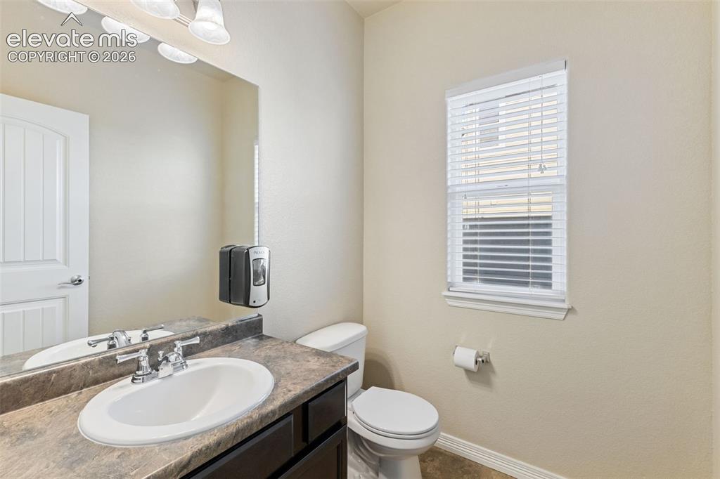 Image 14 of 46: Main level powder room
