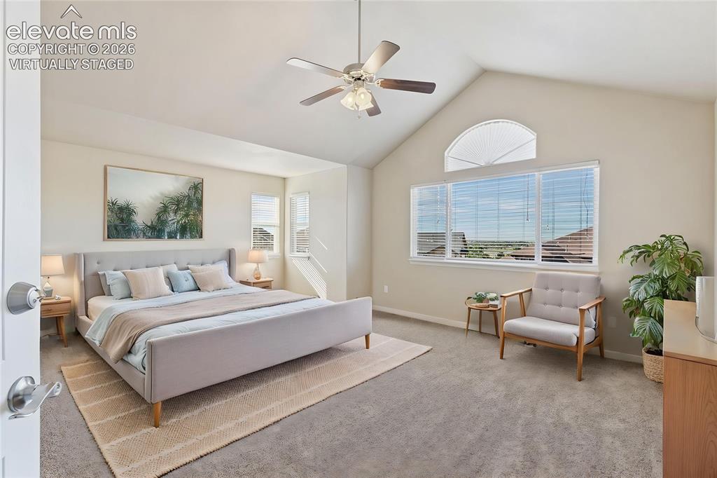 Image 15 of 46: Virtually staged.  Massive primary suite with 5-piece ensuite bathroom and 