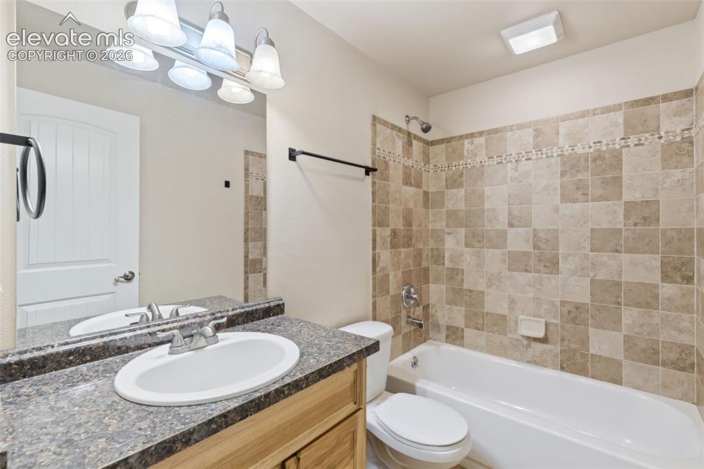 Image 33 of 46: Full bathroom in basement.