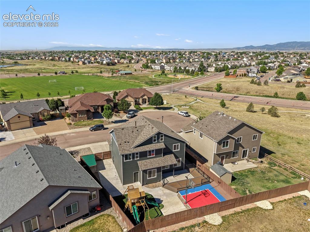 Image 41 of 46: Just steps away from a park, urban trails, soccer field, and BMX track