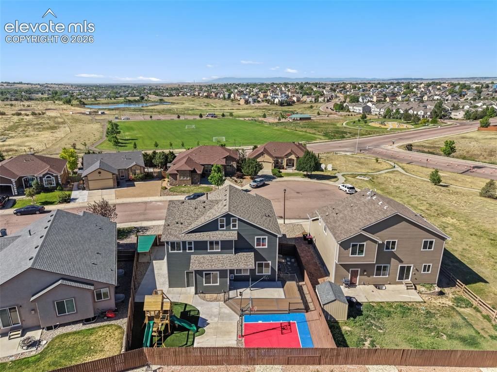 Image 42 of 46: Just steps away from a park, urban trails, soccer field, and BMX track