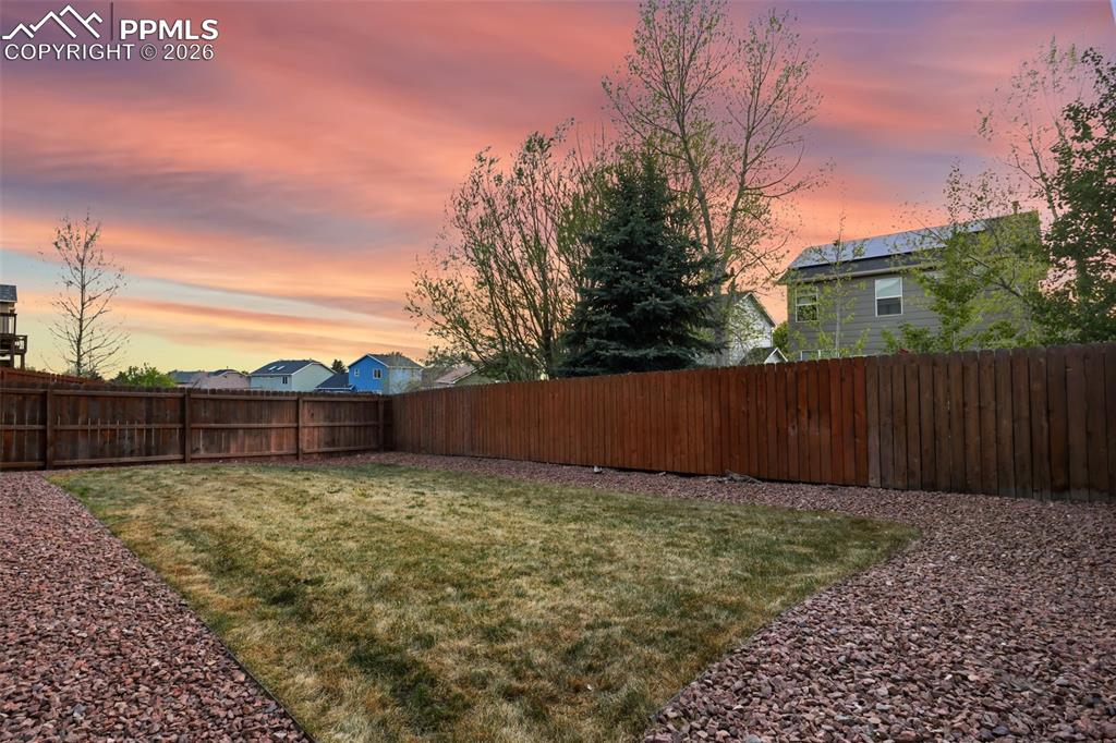 Image 34 of 36: Fully fenced backyard.