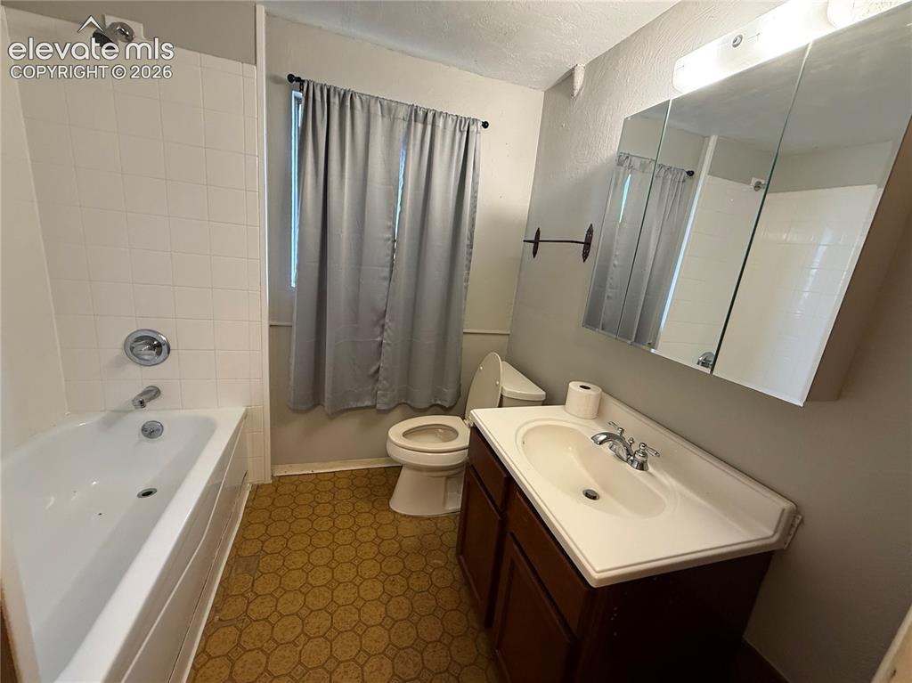 Image 14 of 27: Upstairs bathroom primary
