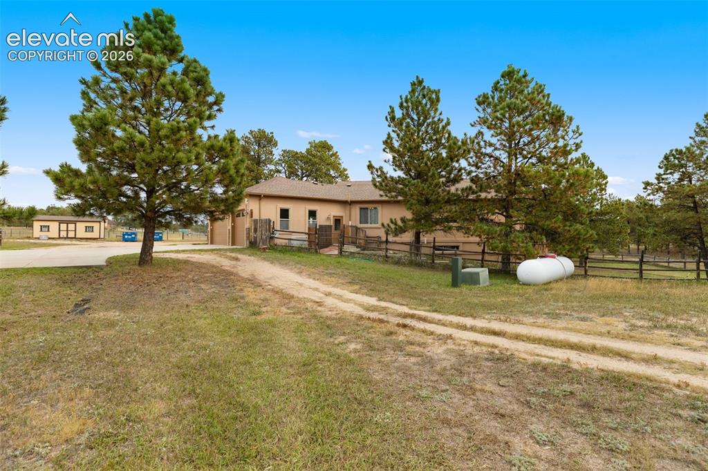 Image 4 of 47: Side view of the home 