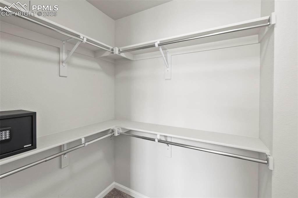 Image 22 of 24: View of walk in closet
