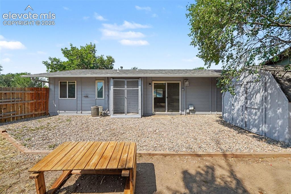 Image 18 of 19: Backyard with storage shed