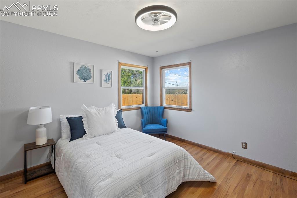 Image 10 of 30: Bedroom featuring light wood-type flooring