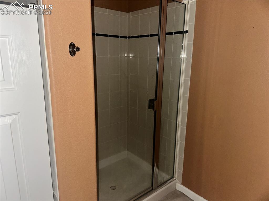 Image 34 of 39: Basement 3/4 bath