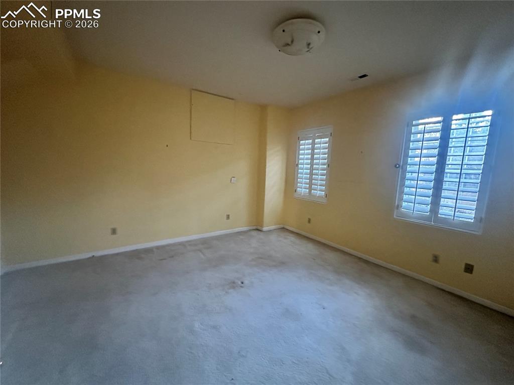 Image 36 of 39: 4th bedroom in the finished walk out basement