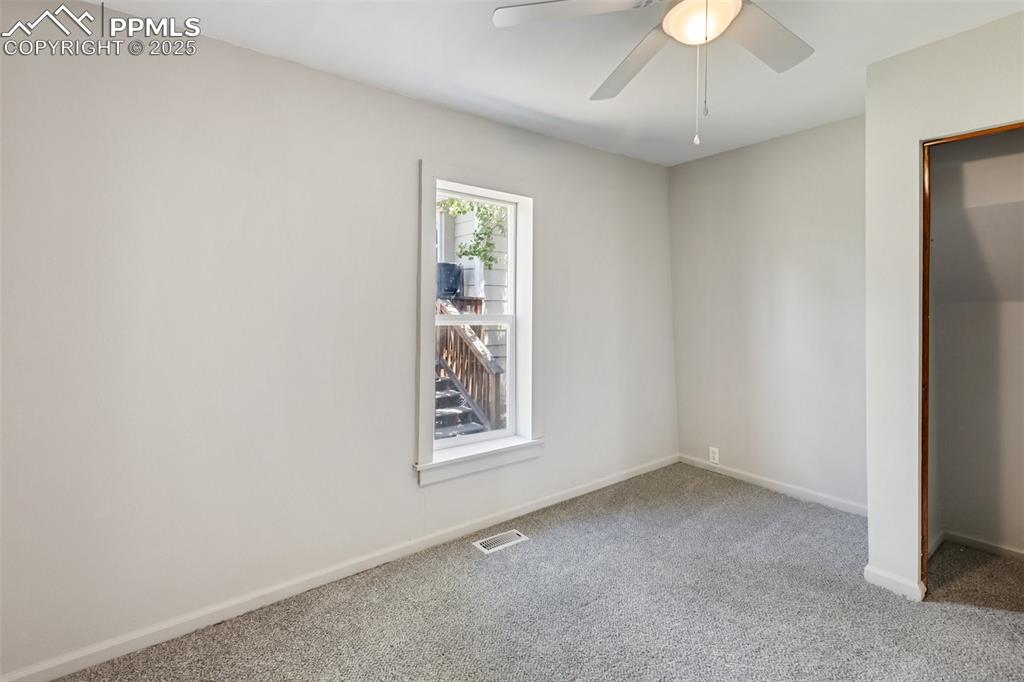 Image 34 of 36: you can see the closet and another window in this bedroom this is the one n