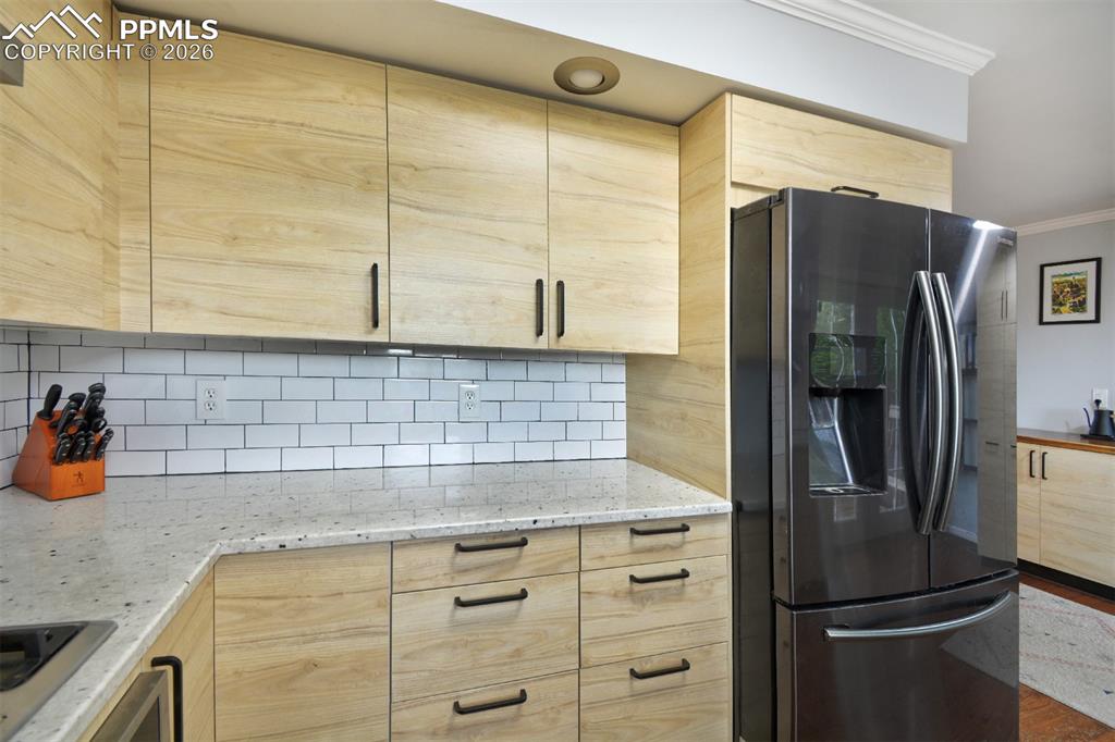 Image 11 of 27: Ample amount of counter space and cabinets perfect for food prep!