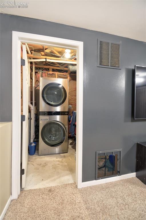 Image 23 of 27: Laundry area in lower level.