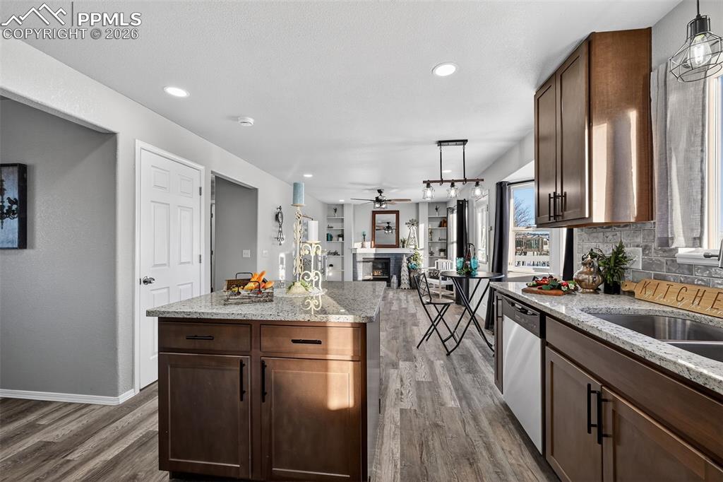 Image 13 of 50: Looking at the family room from the kitchen.