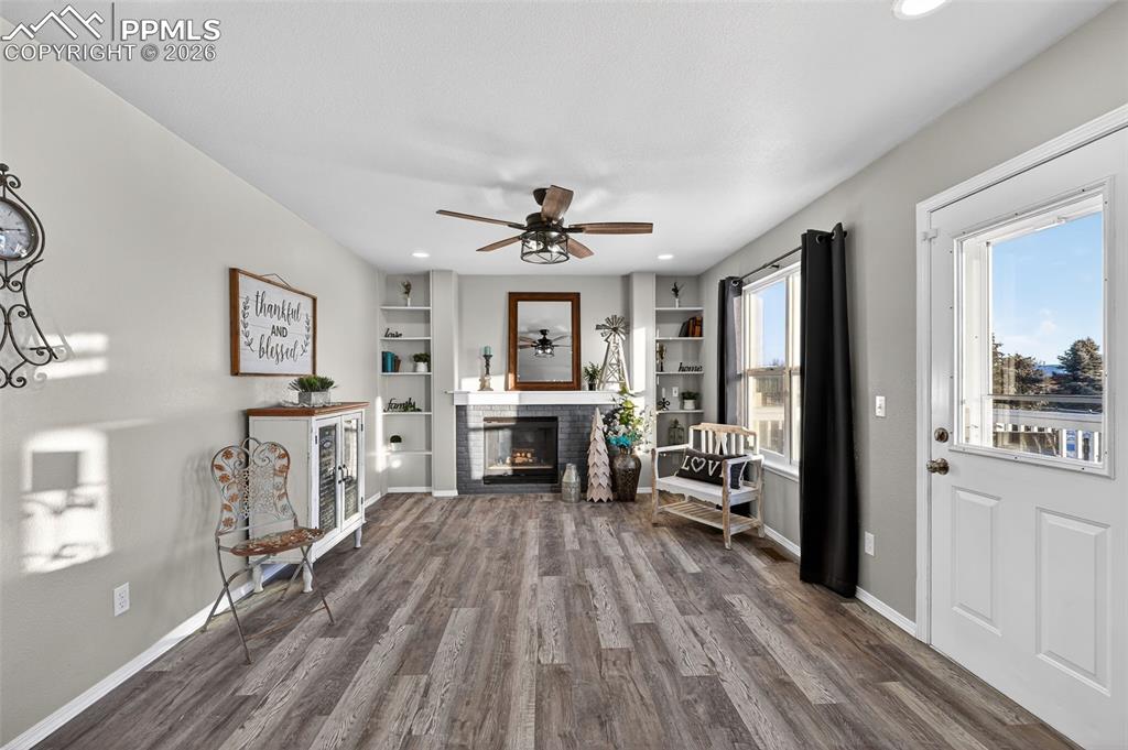 Image 16 of 50: Another view of the family room. The door to the right goes out onto the de