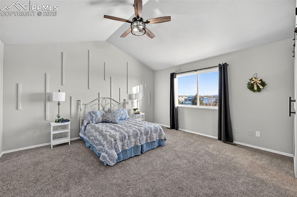 Image 23 of 50: A designer element with the wall and a new ceiling fan.