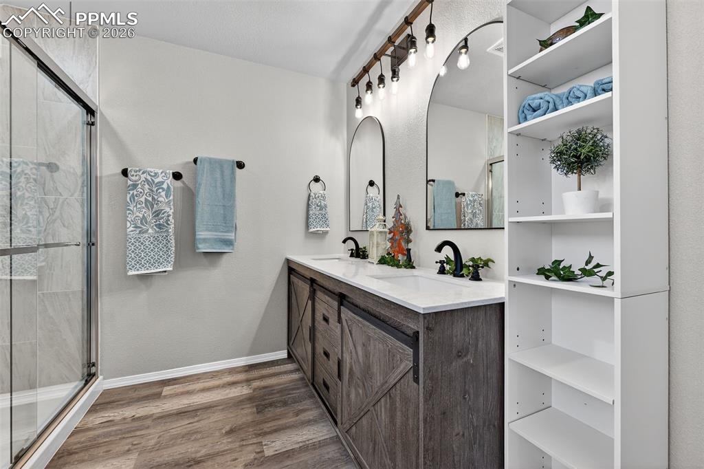 Image 25 of 50: A double vanity with plenty of room for 2 people to get ready for an event.