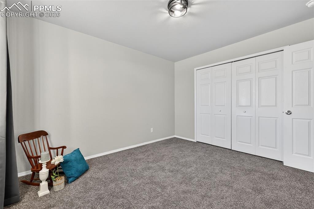 Image 33 of 50: Another view of a secondary bedroom.