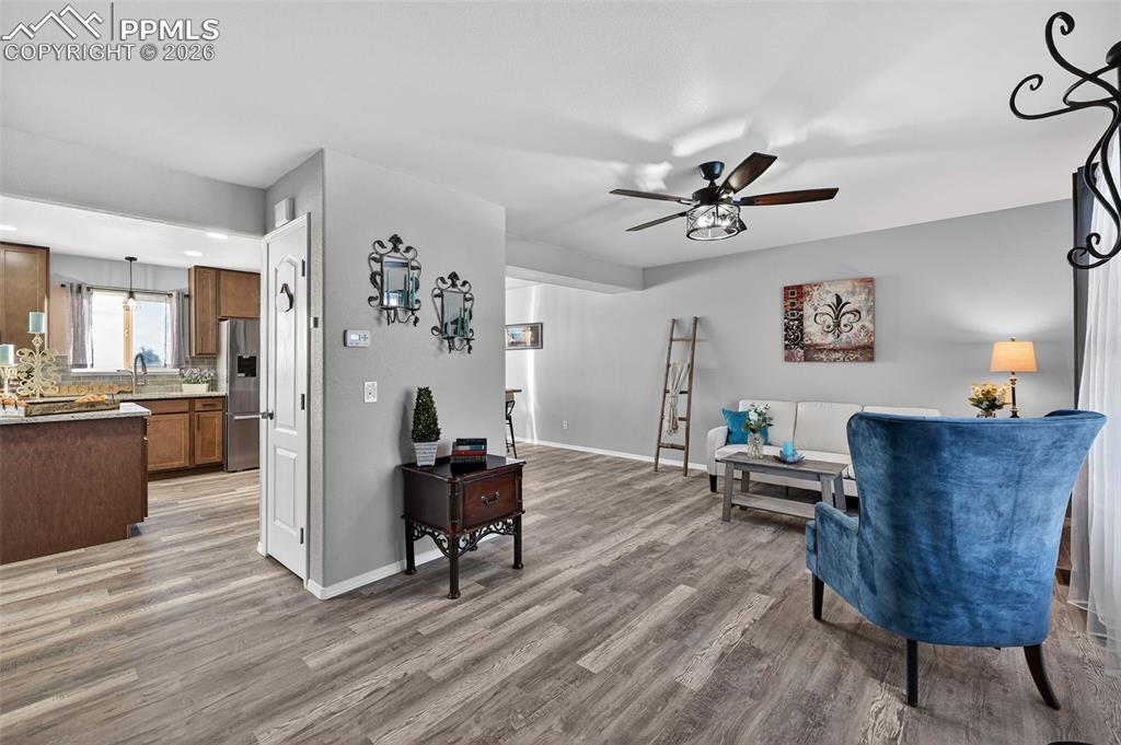 Image 4 of 50: Looking into the kitchen & dining room from the front door.