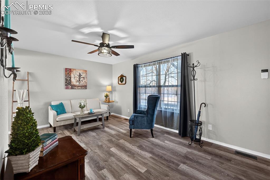 Image 5 of 50: Looking at the living room from the kitchen.
