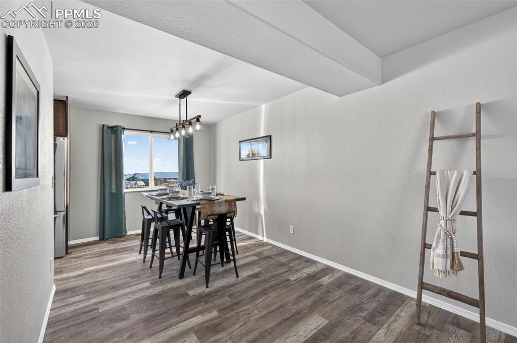 Image 8 of 50: Looking into the dining room from the living room.