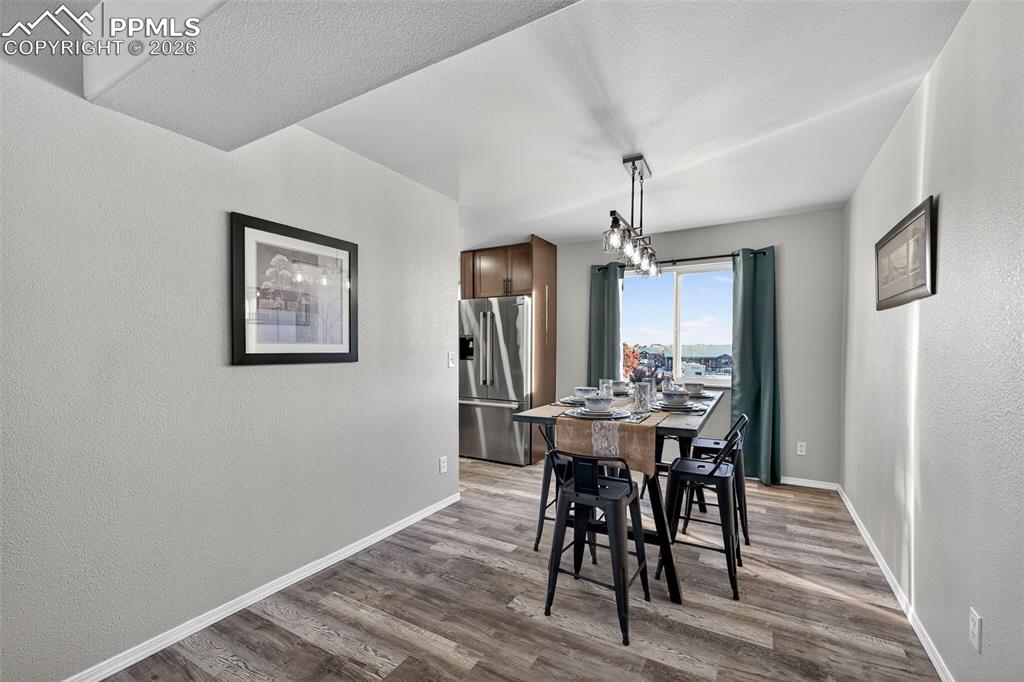 Image 9 of 50: All new light fixtures and ceiling fans throughout the home add so much.
