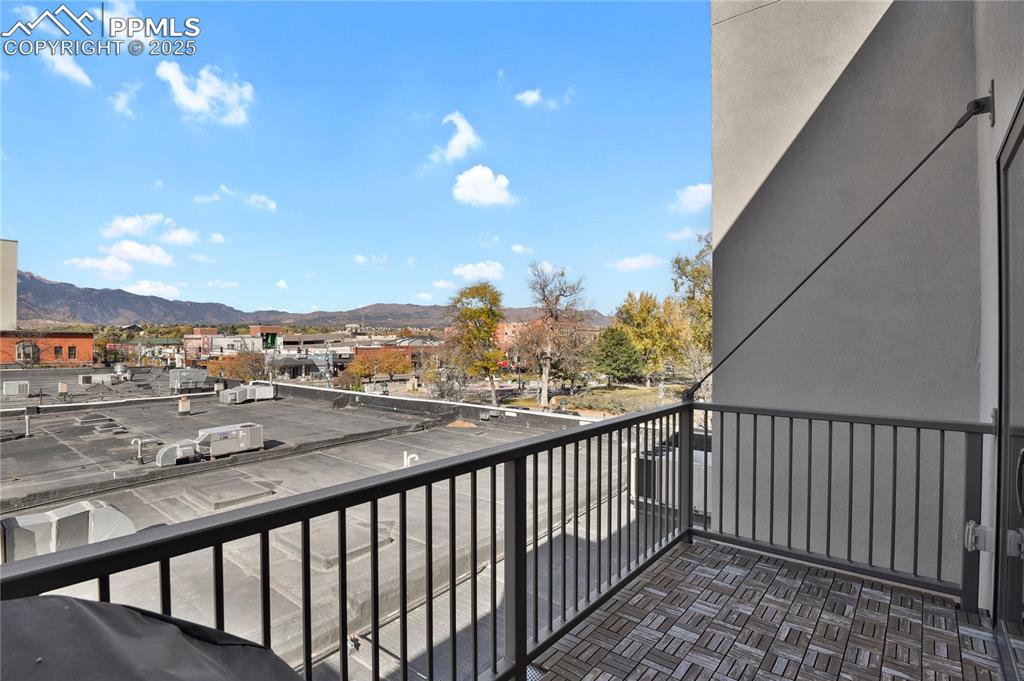 Image 13 of 33: Enjoy sunset views of the city, mountains and park from your private west-f